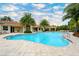 Gorgeous community pool with plenty of lounge seating on the surrounding patio at 4267 Expedition Way, Osprey, FL 34229