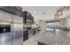 Well-equipped kitchen with stainless steel appliances, granite countertops, and ample cabinet space at 4267 Expedition Way, Osprey, FL 34229