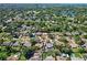 An aerial view of a neighborhood with swimming pools and lush green landscaping at 4505 18Th W Ave, Bradenton, FL 34209