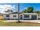 Single-story home with neutral paint, well-manicured lawn, and an attached garage at 4505 18Th W Ave, Bradenton, FL 34209