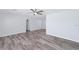 Bright and spacious living room with wood-look flooring and neutral walls at 4505 18Th W Ave, Bradenton, FL 34209