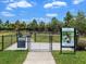An enclosed Bark Park providing a safe, fun area for dogs to play at 4704 Sarca Ct, Lakewood Ranch, FL 34211