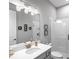 Bathroom with walk-in shower and vanity with white countertop and modern fixtures at 4704 Sarca Ct, Lakewood Ranch, FL 34211