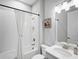 Bathroom featuring a shower/tub combo, white vanity, and neutral paint at 4704 Sarca Ct, Lakewood Ranch, FL 34211