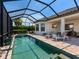 Beautiful pool area with lounge chairs, perfect for relaxing and soaking up the sun in privacy at 4704 Sarca Ct, Lakewood Ranch, FL 34211