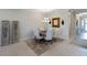 Elegant dining room featuring a round table, upholstered chairs, and stylish decor at 4735 Cassio Ct, Bradenton, FL 34211