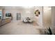 Comfortable dining room area with seating, decor, and adjacent living space at 4735 Cassio Ct, Bradenton, FL 34211