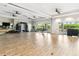 A large fitness center is well equipped and features large glass doors at 4735 Cassio Ct, Bradenton, FL 34211