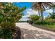Beautifully landscaped golf cart path leading to golfing facilities, adding to the community's charm at 4735 Cassio Ct, Bradenton, FL 34211