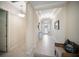 Entryway with tiled floor, decorative lighting, and neutral walls at 4735 Cassio Ct, Bradenton, FL 34211