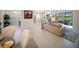 Open floor plan flows from the living room to the kitchen, dining, and office areas at 4735 Cassio Ct, Bradenton, FL 34211