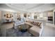 Bright open concept living room with modern kitchen and dining area; perfect for entertaining at 4735 Cassio Ct, Bradenton, FL 34211