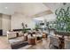 Stylish lounge area featuring elegant decor, comfortable seating, and ample natural light at 4735 Cassio Ct, Bradenton, FL 34211