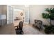 Open doorway to a view of the dining room with seating and decor at 4735 Cassio Ct, Bradenton, FL 34211