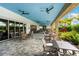 Outdoor dining area with tables, chairs, and scenic views at 4735 Cassio Ct, Bradenton, FL 34211