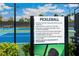 Informational pickleball sign outlining court rules and etiquette for community players at 4735 Cassio Ct, Bradenton, FL 34211
