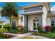 Inviting sports center entrance with colorful flowers and well-maintained landscaping, enhancing curb appeal at 4735 Cassio Ct, Bradenton, FL 34211