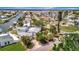Waterfront homes with boat docks and a canal leading to the open bay under a bright, sunny sky at 4819 Palmetto Point Dr, Palmetto, FL 34221