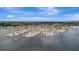 Expansive aerial shot showing waterfront homes nestled along bays, showcasing prime coastal real estate opportunities at 4819 Palmetto Point Dr, Palmetto, FL 34221