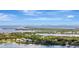 Scenic aerial view showcasing waterfront homes and a bridge over tranquil blue waters, ideal for coastal living at 4819 Palmetto Point Dr, Palmetto, FL 34221