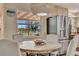 Dining area with a view featuring modern furnishings and natural light at 4819 Palmetto Point Dr, Palmetto, FL 34221