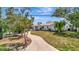 Well-maintained home features a lush front yard and a curved driveway, blending comfort and curb appeal at 4819 Palmetto Point Dr, Palmetto, FL 34221