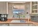 Well-lit kitchen with a window above the sink, ample counter space, and modern appliances at 4819 Palmetto Point Dr, Palmetto, FL 34221
