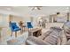 Open-concept living area with tile flooring, comfortable seating, and access to kitchen at 4819 Palmetto Point Dr, Palmetto, FL 34221