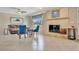 Cozy living area showcasing a charming fireplace and bright neutral-toned walls at 4819 Palmetto Point Dr, Palmetto, FL 34221