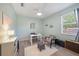 Cozy bedroom with a desk, chair, and ample natural light, perfect for a home office or study at 5619 Oak Grove Ct, Sarasota, FL 34233