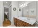 Bathroom with double sinks, vanity and tile floors at 5662 Fossano Dr, Sarasota, FL 34238