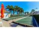 Enjoy the outdoors playing bocce ball surrounded by lush landscaping and clear blue skies at 5662 Fossano Dr, Sarasota, FL 34238