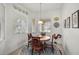 Cozy breakfast nook with ample natural light and decorative wall plates at 5662 Fossano Dr, Sarasota, FL 34238