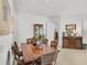 Elegant dining room with a classic table and chairs at 5662 Fossano Dr, Sarasota, FL 34238