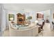 Inviting living room featuring stylish decor and an open layout to the kitchen at 5662 Fossano Dr, Sarasota, FL 34238