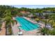 Lap pool surrounded by lush landscaping, offering a private and serene swimming experience at 5779 Wilena Pl, Sarasota, FL 34238