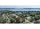 An aerial view showcases the property's location close to the water and the surrounding neighborhood at 616 59Th Nw St, Bradenton, FL 34209