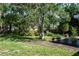 Spacious backyard featuring mature trees at 616 59Th Nw St, Bradenton, FL 34209