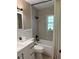 Stylish bathroom with tub, modern fixtures and decorative tile at 616 59Th Nw St, Bradenton, FL 34209