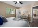 Bedroom features hardwood floors, a ceiling fan and neutral paint at 616 59Th Nw St, Bradenton, FL 34209