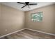 Bedroom features updated flooring and natural lighting at 616 59Th Nw St, Bradenton, FL 34209