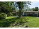 Charming single-story home with a well-manicured front lawn at 616 59Th Nw St, Bradenton, FL 34209