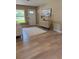 Inviting living room space featuring hardwood floors, neutral paint, and furniture to create a soothing interior at 616 59Th Nw St, Bradenton, FL 34209
