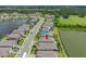 Aerial view displays the property near two lakes, showing its location and surrounding neighborhoods at 6550 Devesta Loop, Palmetto, FL 34221