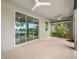 This lanai features ample space, several ceiling fans, and a lovely water view at 6550 Devesta Loop, Palmetto, FL 34221