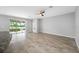 The living room has a large window with backyard lake views at 6550 Devesta Loop, Palmetto, FL 34221