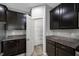 Spacious walk-in pantry with ample shelving for organized storage next to the kitchen at 6550 Devesta Loop, Palmetto, FL 34221