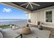 Relax on the swing and enjoy the view from this spacious balcony with luxury finishes at 676 Regatta Way, Bradenton, FL 34208