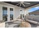 Relax on this luxury balcony, complete with stylish seating and offering picturesque water views at 676 Regatta Way, Bradenton, FL 34208
