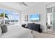 This main bedroom features lots of light and serene views of the outdoors at 676 Regatta Way, Bradenton, FL 34208